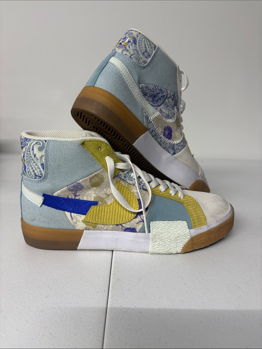 Nike White High-Top Sneakers with Blue & Yellow Accents